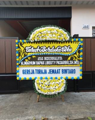 Papan Bunga Duka di Latta